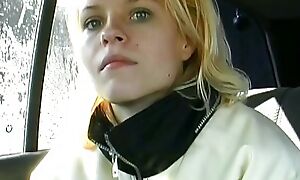 Blonde teen from Germany stuffing a candle thither her tight distend